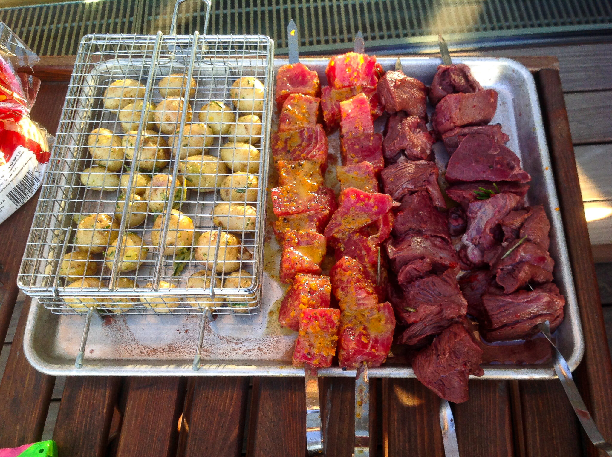 Skewers of shashlik ready to go onto the grill