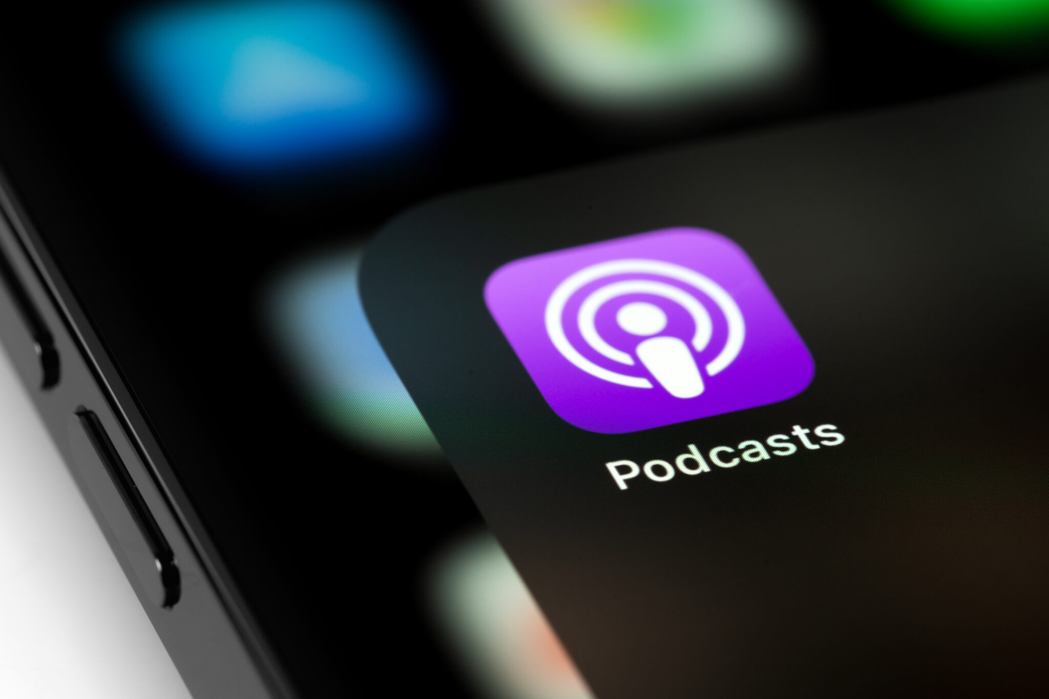 picture of an iPhone with the podcast app on it