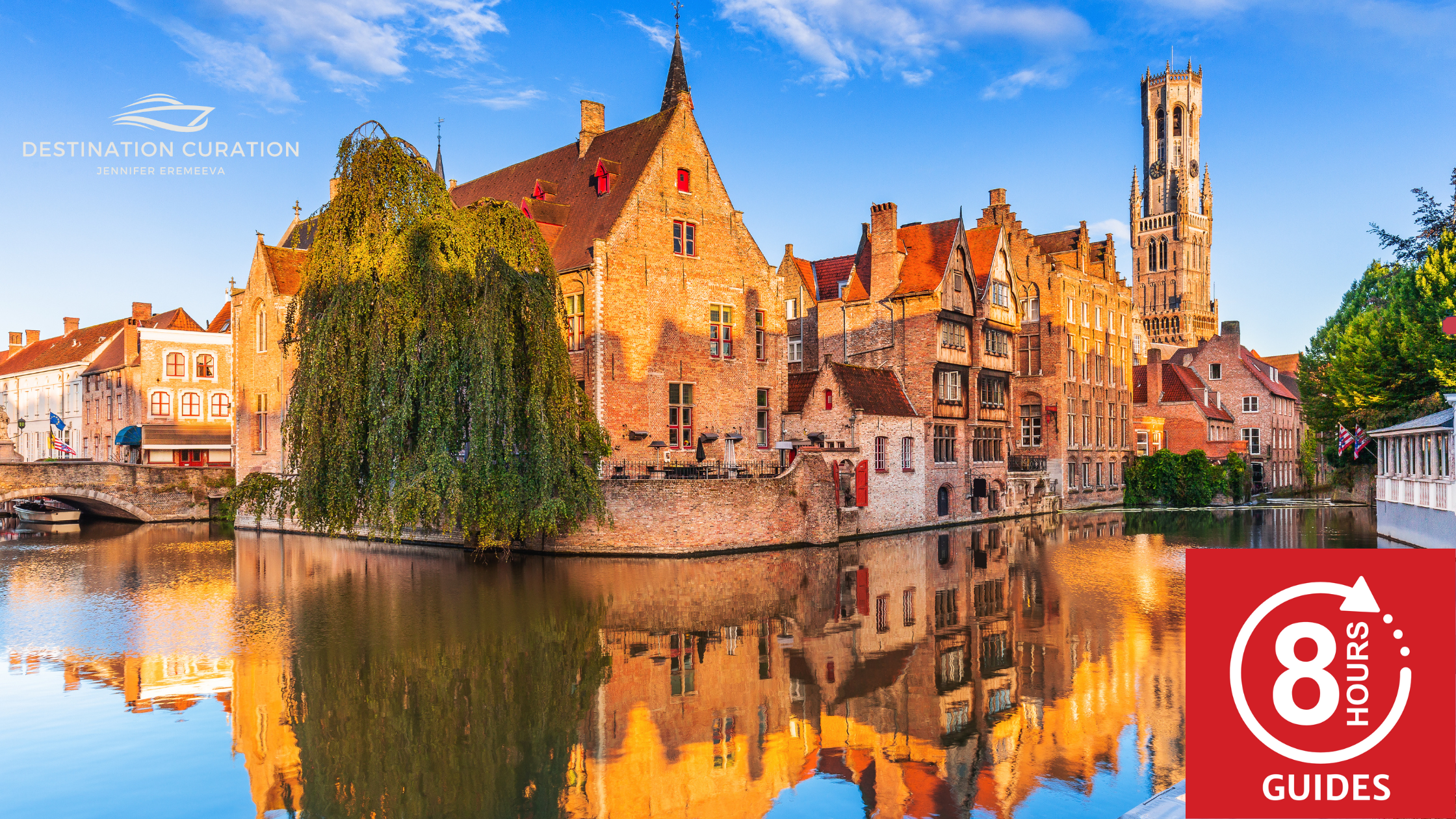 View of a canal in Bruges Belgium, stone buildings reflected in the water.