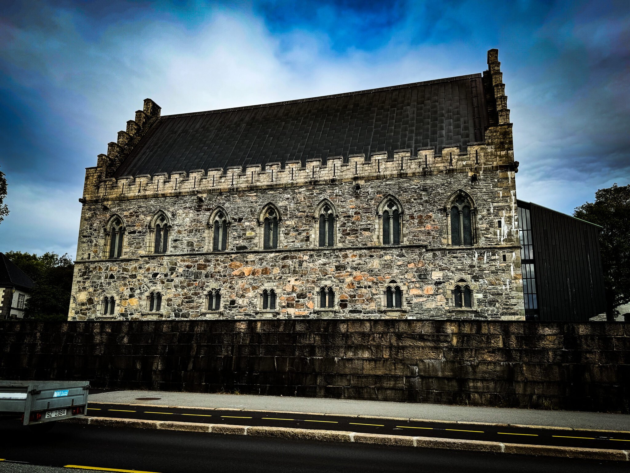 Large stone building against a cloudy sky